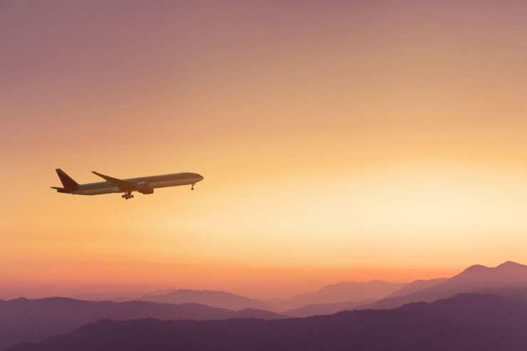 travel-airplane-in-sunset-sky(1) About us travel-airplane-in-sunset-sky